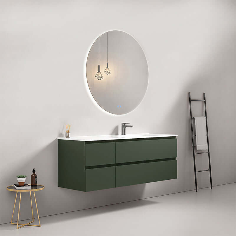 Mobile bagno sospeso 140 cm Verde Comodoro con lavabo a destra e specchio tondo retroilluminato.