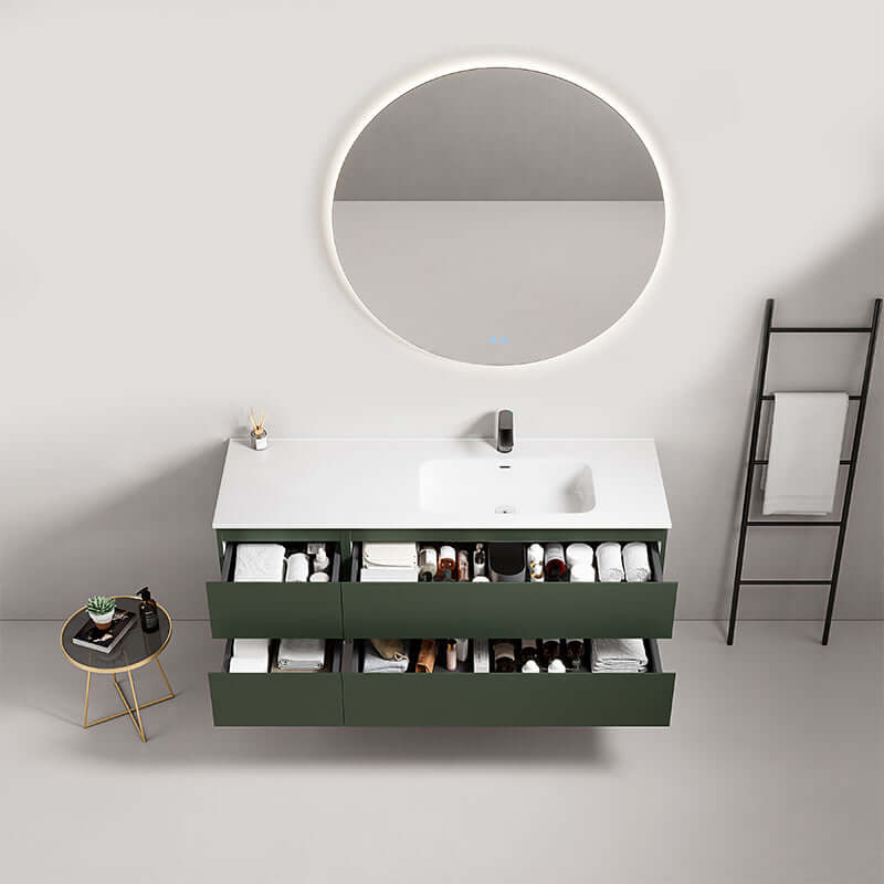Mobile bagno sospeso 140 cm Verde Comodoro con lavabo a destra e specchio tondo retroilluminato.