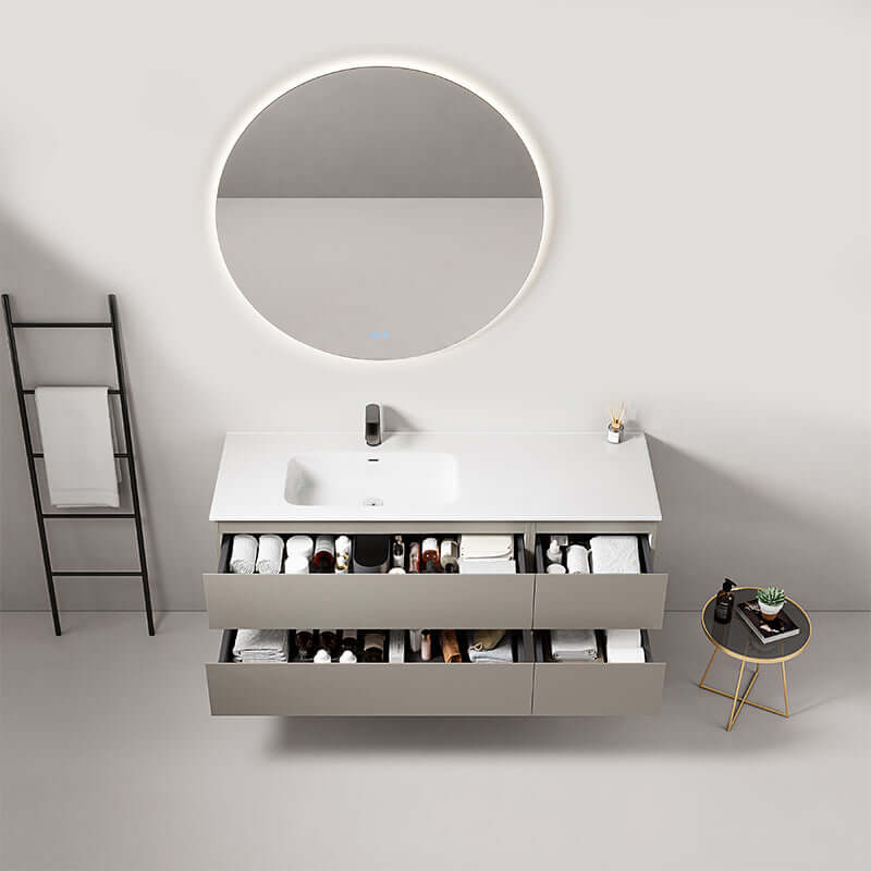 Mobile bagno sospeso 140 cm Grigio Cenere con lavabo a sinistra e specchio tondo retroilluminato.