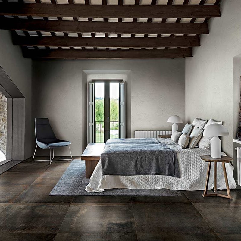 Modern bedroom featuring Gres Porcellanato Effetto Cemento 80x80 tiles from Florim, with natural light and stylish decor.