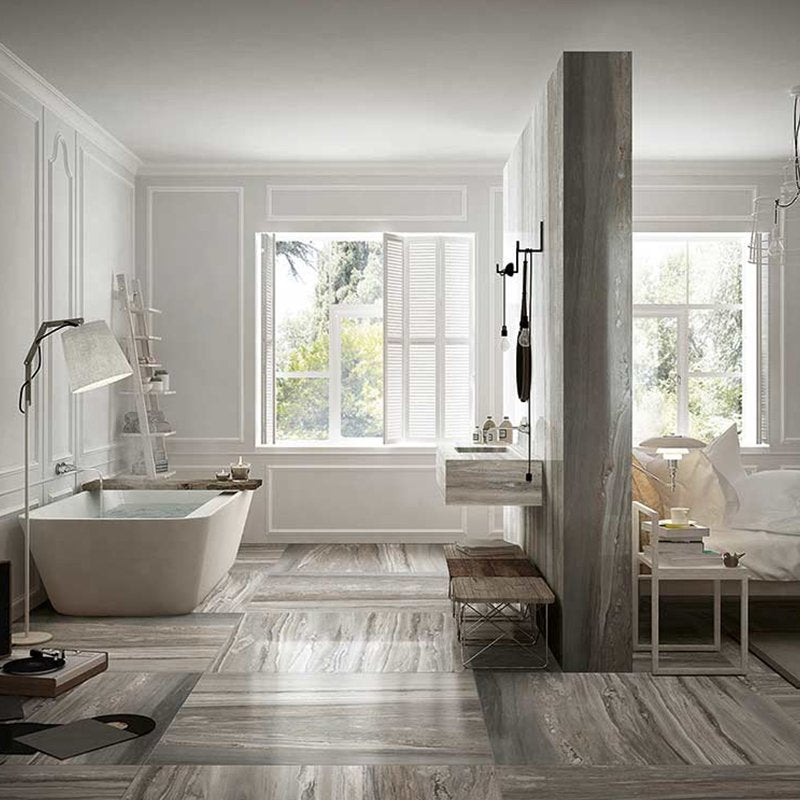 Modern bathroom featuring Gres Porcellanato Effetto Marmo Rettificato Lucido flooring in gray tones, showcasing elegant design.