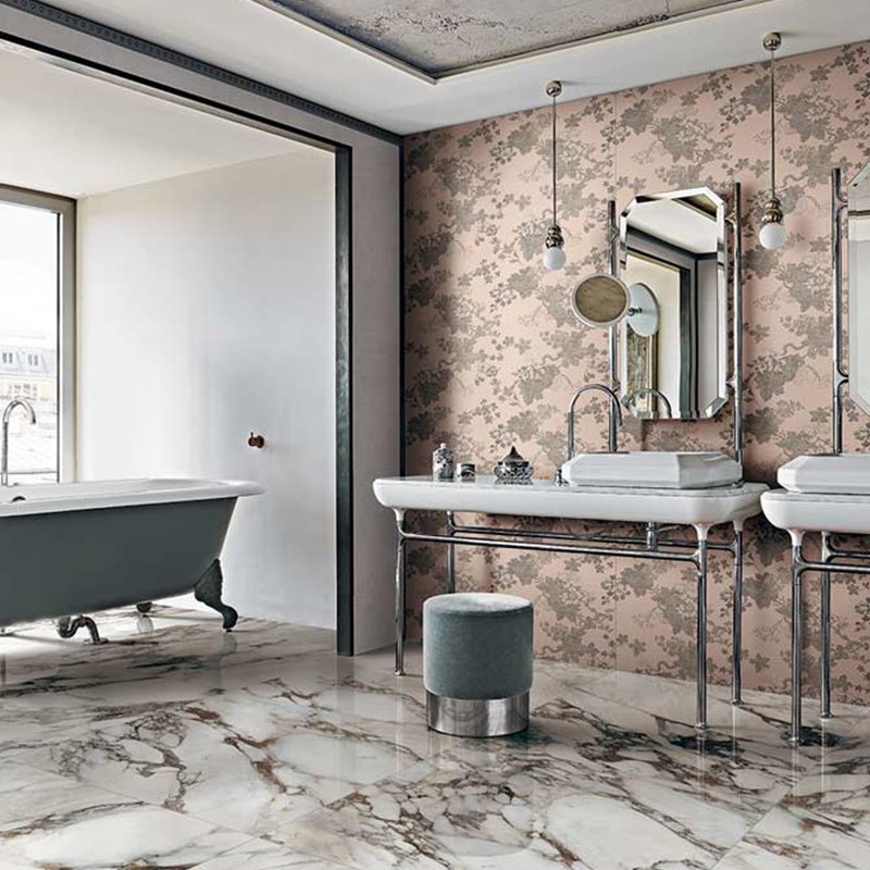 Luxurious bathroom featuring Gres Porcellanato effett Marmo flooring and elegant fixtures, showcasing modern design.