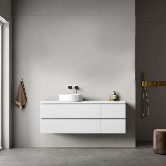 Mobile bagno sospeso reversibile bianco opaco con lavabo d'appoggio, design moderno e funzionalità elegante.