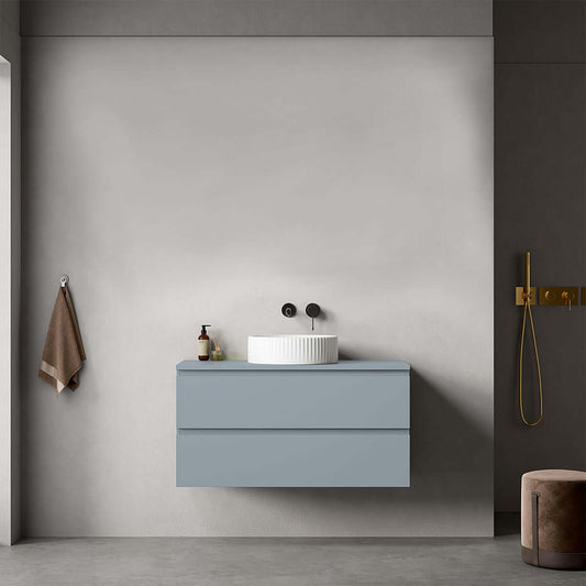 Mobile bagno sospeso 100 cm Blu Avio con lavabo d'appoggio in un design moderno e funzionale per il bagno.