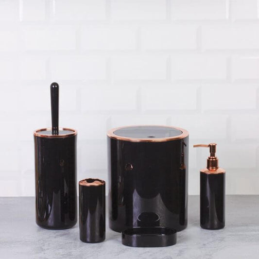 Set accessori da bagno tondo lucido nero e rosa in elegante design moderno.