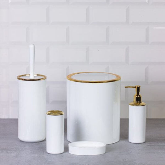 Set di accessori da bagno tondo bianco e oro, design elegante e moderno per un ambiente raffinato.