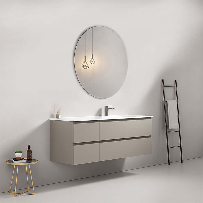 Mobile bagno sospeso Grigio Cenere con lavabo a destra e specchio tondo, design moderno e funzionale.