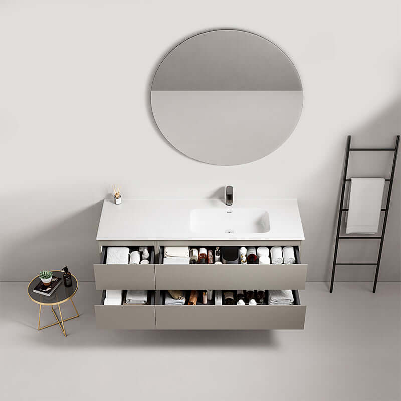 Mobile bagno sospeso 140 cm Grigio Cenere con lavabo a destra e specchio tondo, design moderno e funzionale.