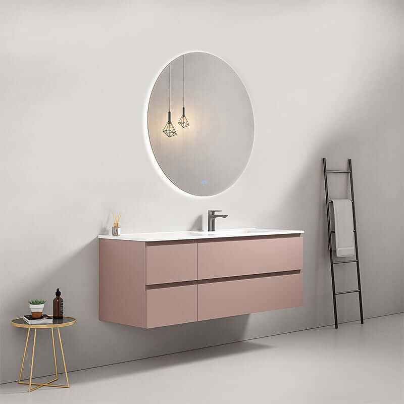 Mobile bagno sospeso 140 cm in Rosa Retro con lavabo a destra e specchio tondo retroilluminato.