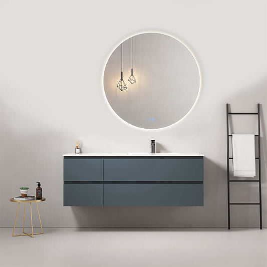 Mobile bagno sospeso 140 cm Blu Mare con lavabo a destra e specchio tonde retroilluminato.