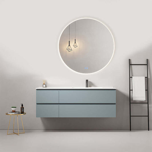 Mobile bagno sospeso Fiji 140 cm in Blu Avio con lavabo a destra e specchio tondo retroilluminato.