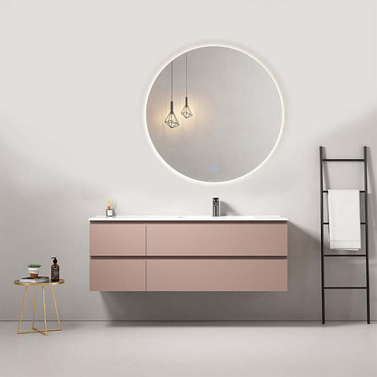 Mobile bagno sospeso rosa retro con lavabo a destra e specchio tondo retroilluminato, design moderno.