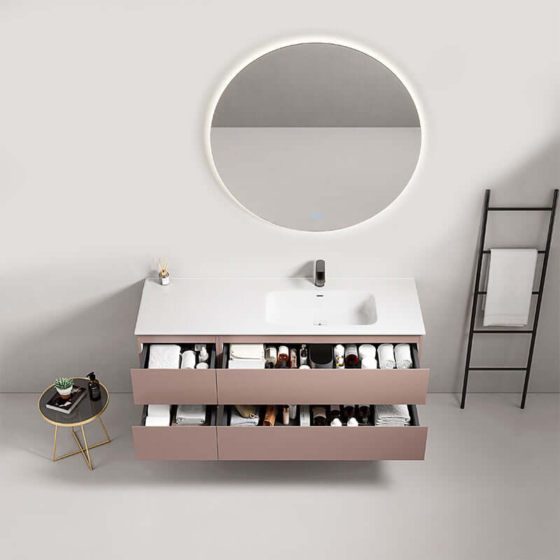 Mobile bagno sospeso 140 cm Rosa Retro con lavabo a destra e specchio tondo retroilluminato.