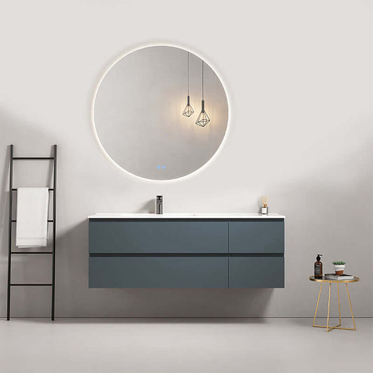 Mobile bagno sospeso 140 cm Blu Mare con lavabo a sinistra e specchio tondo retroilluminato.