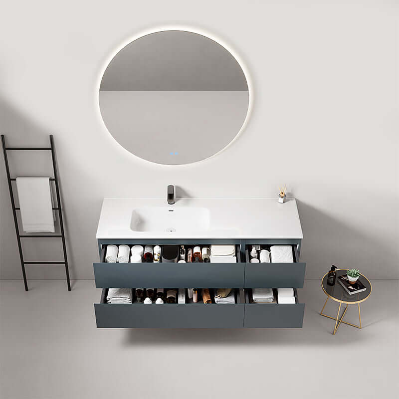 Mobile bagno sospeso 140 cm blu mare con lavabo a sinistra e specchio tondo retroilluminato, design moderno.