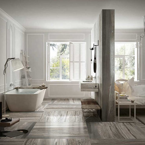 Modern bathroom featuring Gres Porcellanato Effetto Marmo Rettificato Lucido flooring in gray tones, showcasing elegant design.