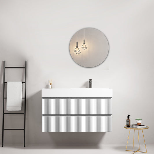 Mobile bagno sospeso cannettato 100 cm Bianco Lavabo a Destra in Resina Specchio Tondo - Fiji Paint in un bagno moderno.
