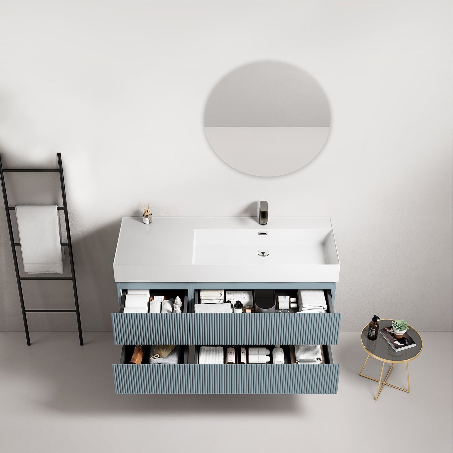 Mobile bagno sospeso cannettato 120 cm Blu Avio Lavabo a Destra in Resina Specchio Tondo - Fiji Paint con cassetti aperti.
