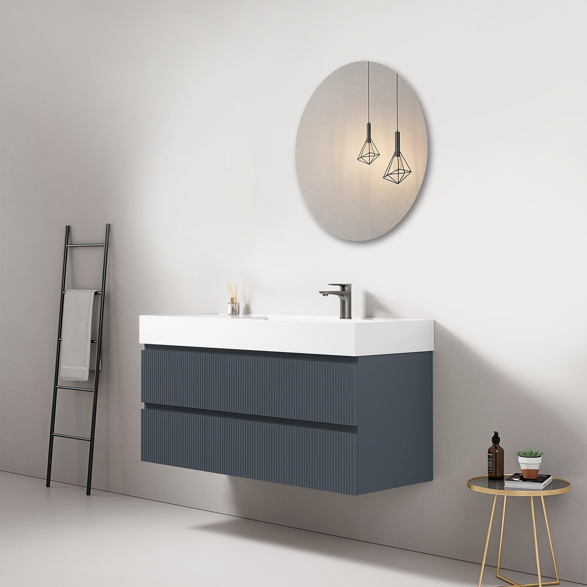 Mobile bagno sospeso cannettato 120 cm Blu Mare Lavabo a Destra in Resina Specchio Tondo - Fiji Paint in un ambiente moderno.
