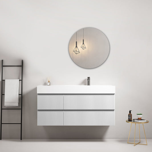 Mobile bagno sospeso cannettato 120 cm Bianco Lavabo a Destra in Resina Specchio Tondo - Fiji Paint in un ambiente moderno.