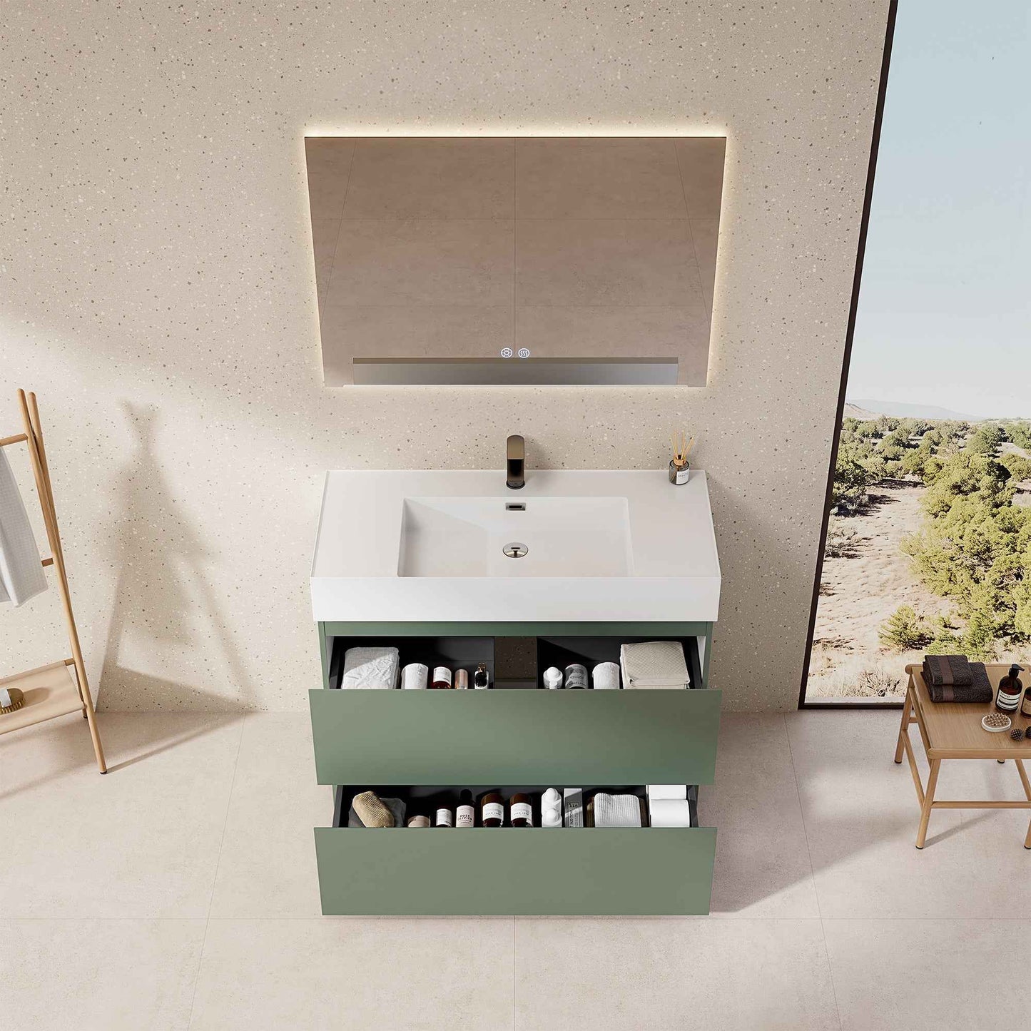Mobile bagno a terra verde salvia 100 cm con lavabo in resina e specchio retroilluminato.