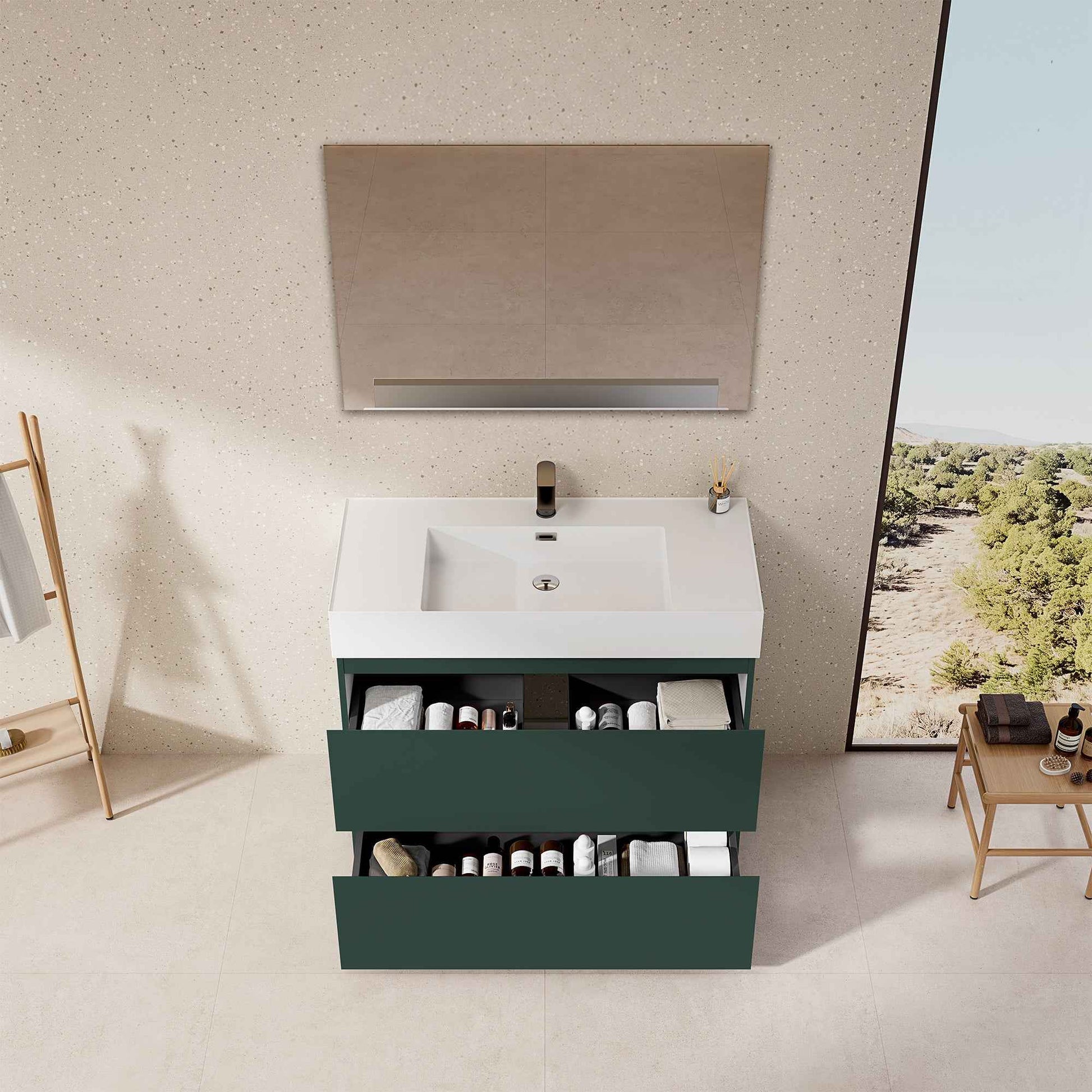 mobile bagno a terra Verde Comodoro con lavabo in resina, mobili capienti e design moderno.