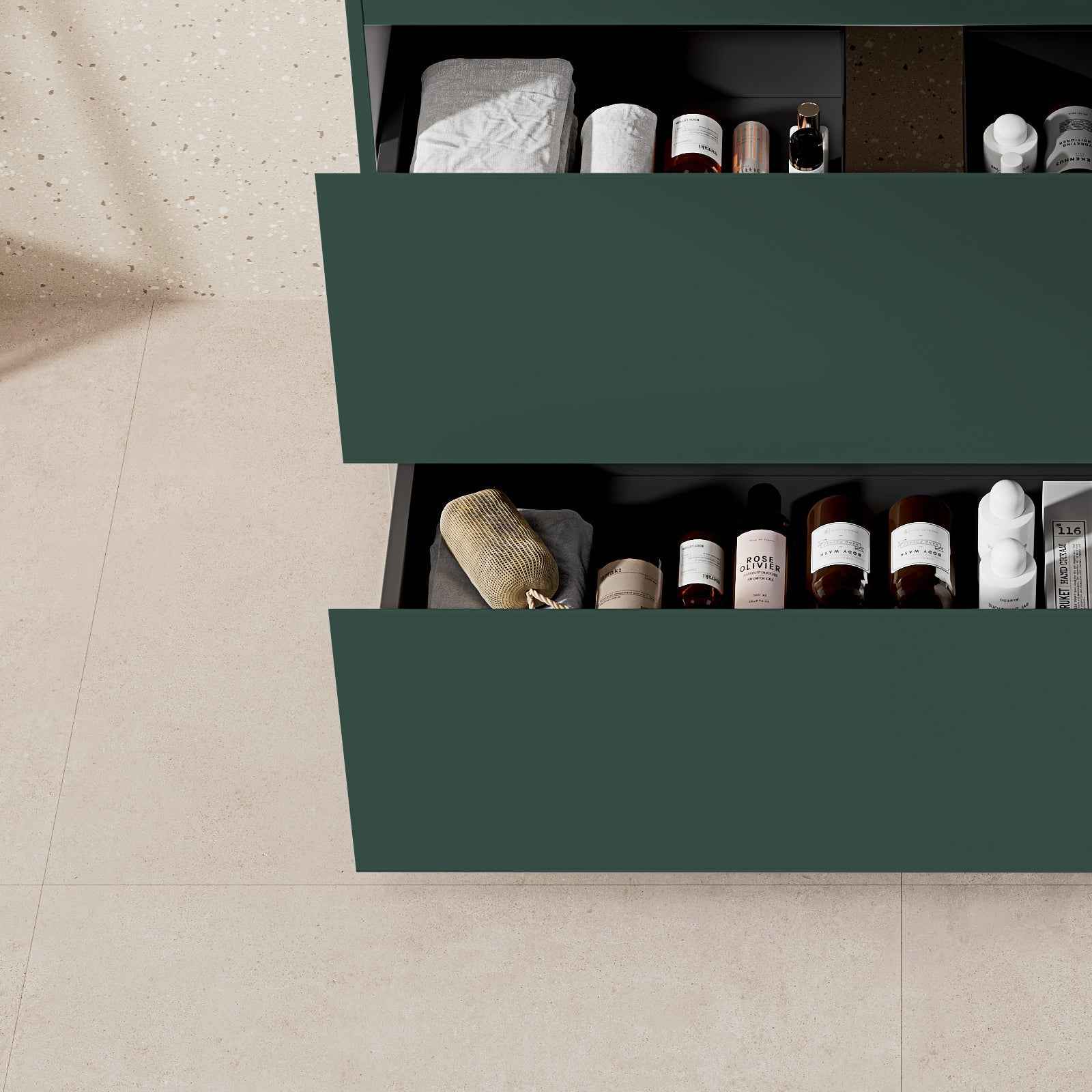 Mobile bagno a terra Verde Comodoro con lavabo in resina, cassetti aperti con prodotti da bagno.