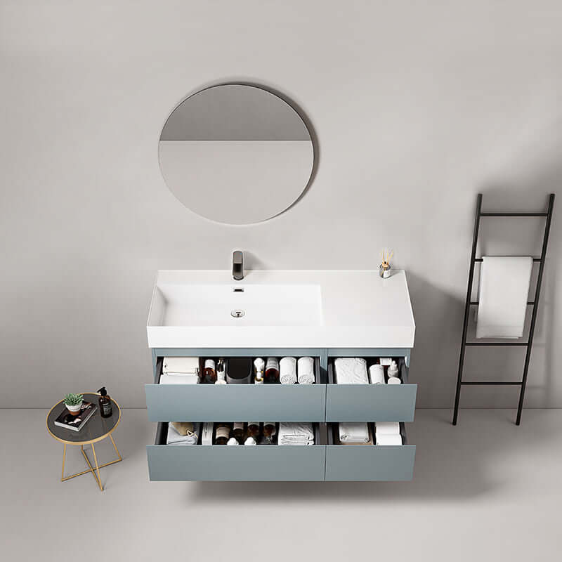 Mobile bagno sospeso Fiji Blu Avio con lavabo a sinistra e specchio tondo, design moderno e funzionale.
