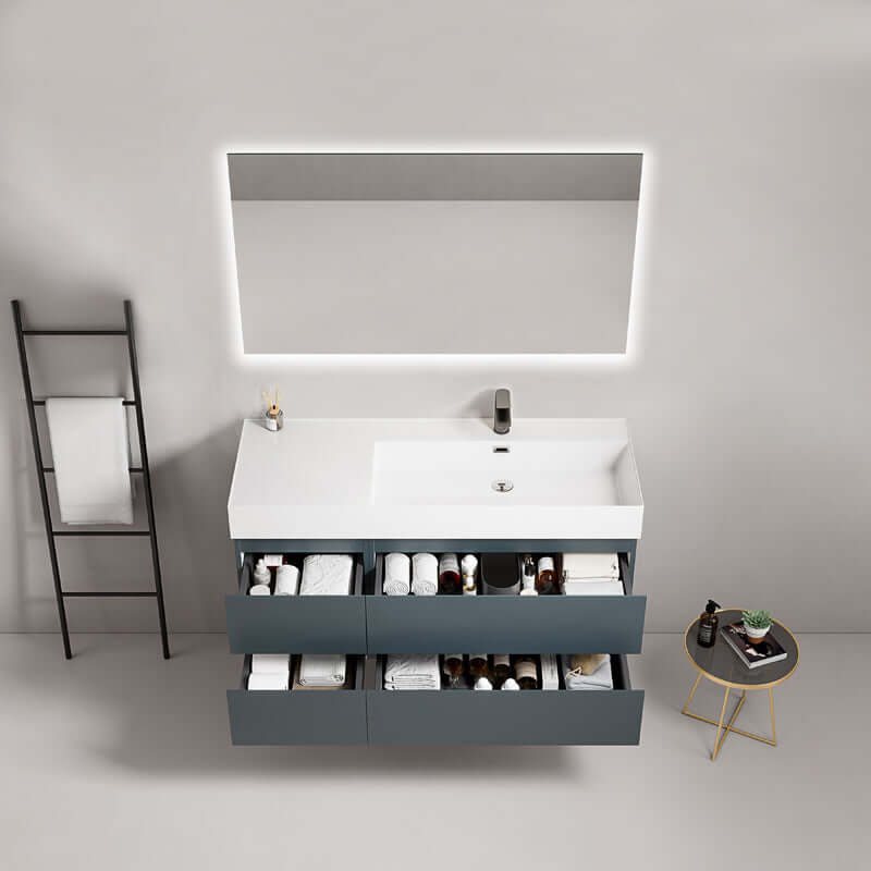 Mobile bagno sospeso Blu Mare con lavabo a destra e specchio retroilluminato, design moderno e funzionale.